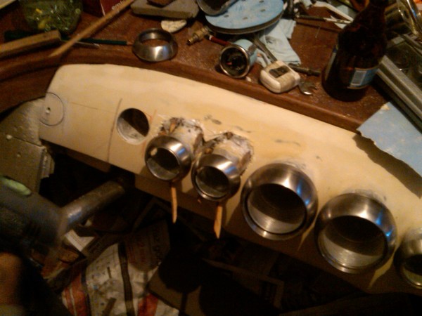 IMG00630-20110501-2201.jpg (613.24 KiB) Viewed 471120 times A hole next to right gauge shows, that the symetry was disturbed.