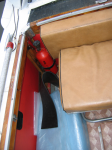 Back seat and engine-compartment fire extinguisher